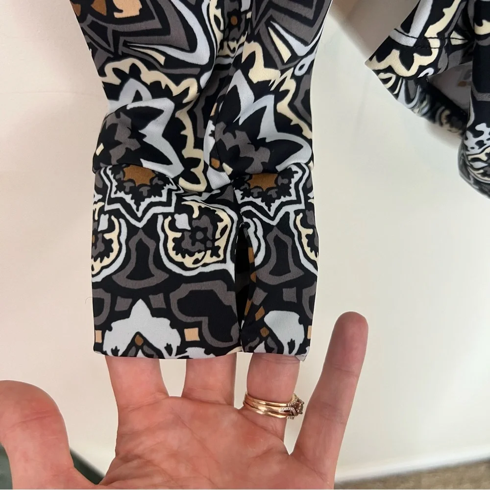Ambernoon II by Dr. Erum Ilyas Floral Print 1/4 Zip Roll Tab Sleeve Rash Guard